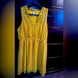 Lovely yellow dress with green patterns